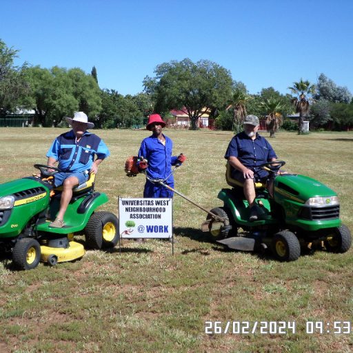Parks & Median Maintenance. Sampie, Lucky & Tonie at work cutting grass